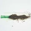 Ein grüner Glasfilter liegt auf einem grünen Longpaper
